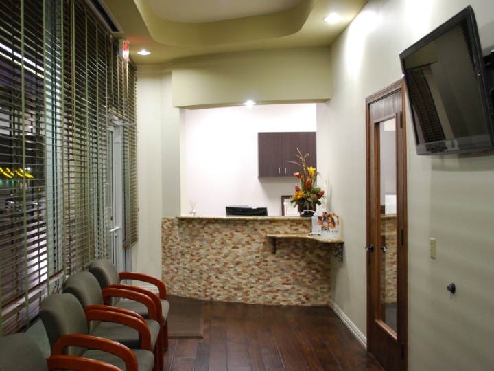 Reception and waiting area at Meridian Dental with comfortable seating and modern decor